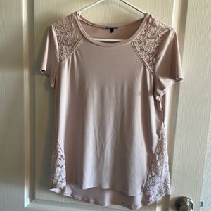 Women’s size medium blouse. 96% Polyester, 4% spandex and lace.